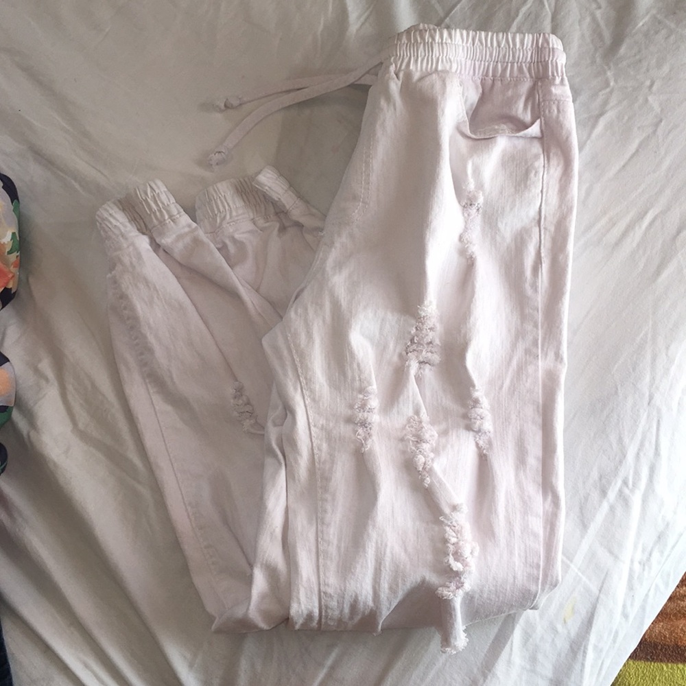 All white jogger jeans.